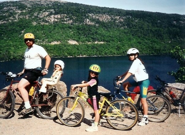 photo of family biking in Acadia National Park