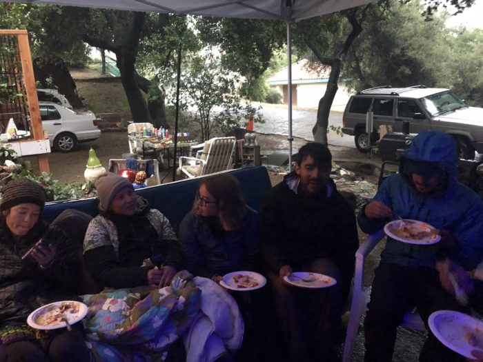 A photo of pct hikers eating taco salad