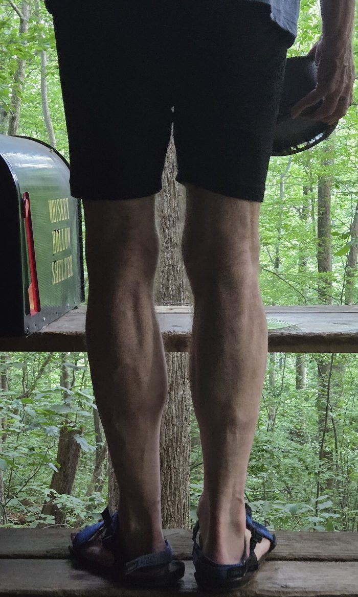 Male hikers that show muscle development