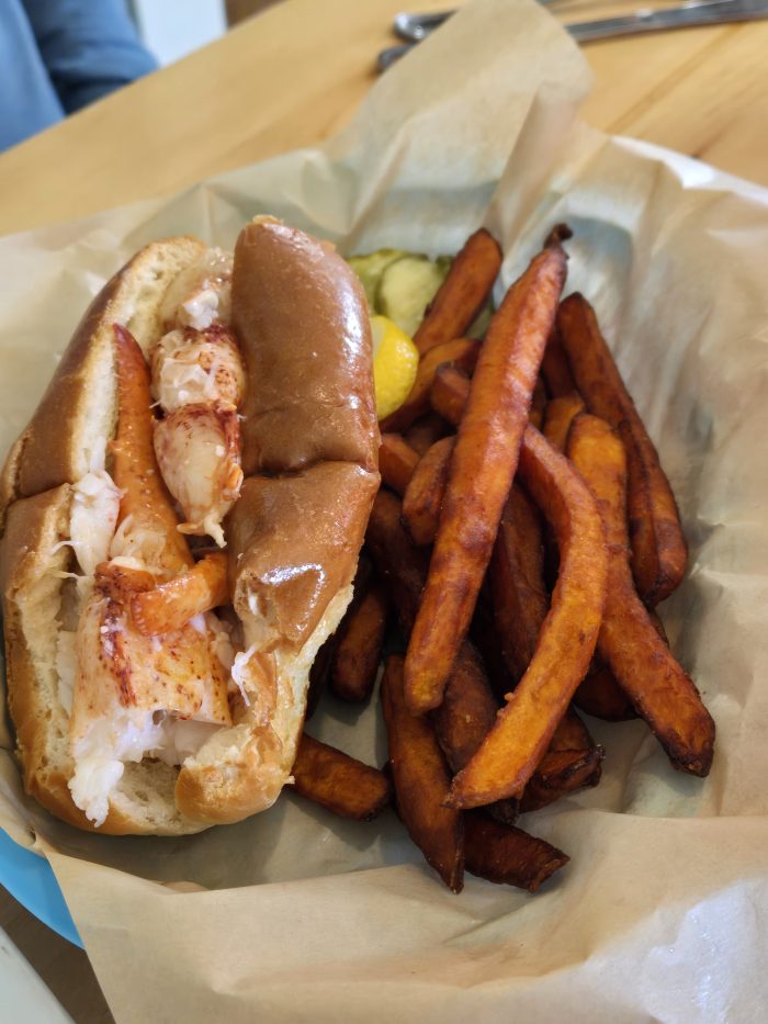 Lobster roll with fried sweet potatoes