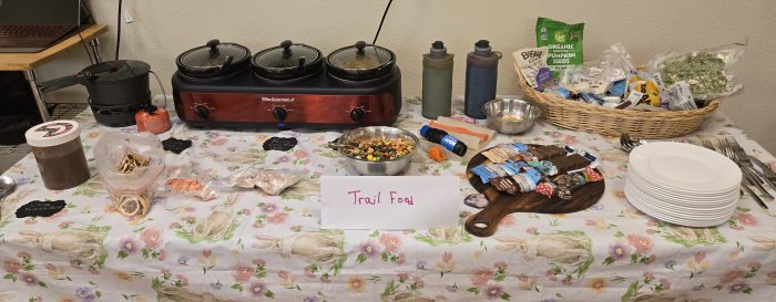 a buffet marked trail food including backpacking food rehydrated