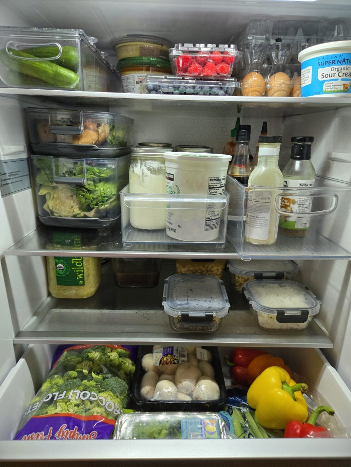 Photo of the inside of an organized refrigerator 