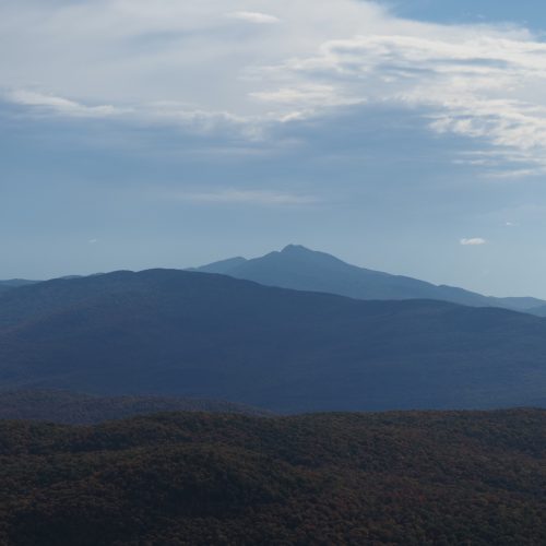 Distance view of tall mountains in shades of blue