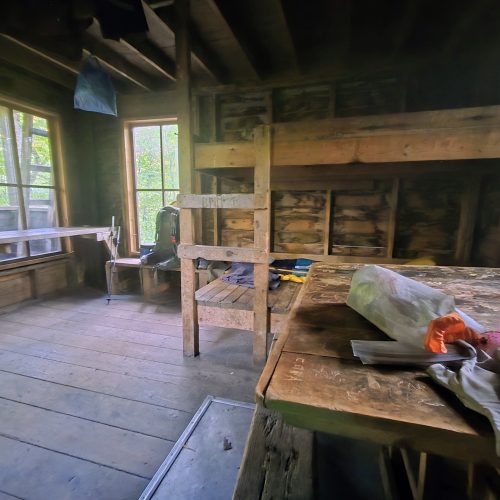 Interior of a rustic camp on the long trail